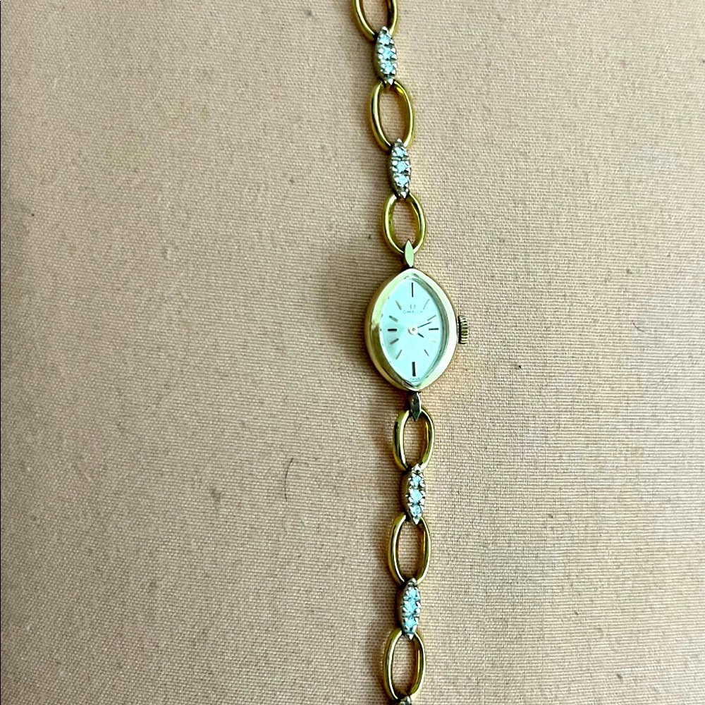 18 karat omega watch with diamond